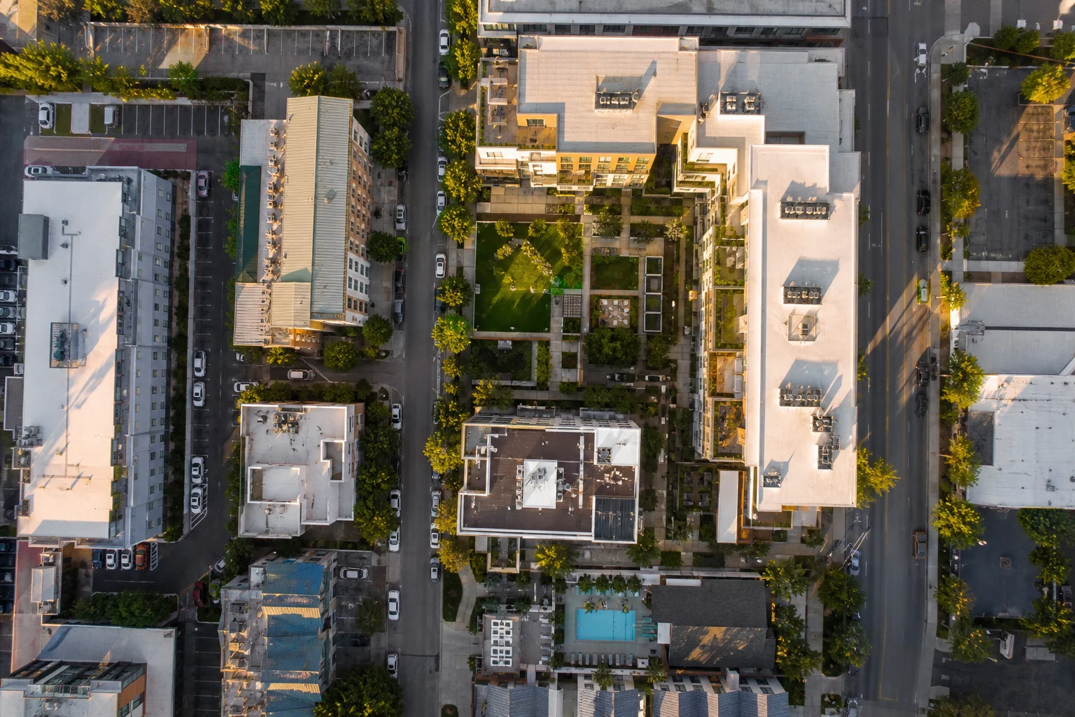 Aerial view of mixed-use real estate development representing the REA Real Estate Accounting Benchmark Report 2026 portfolio coverage