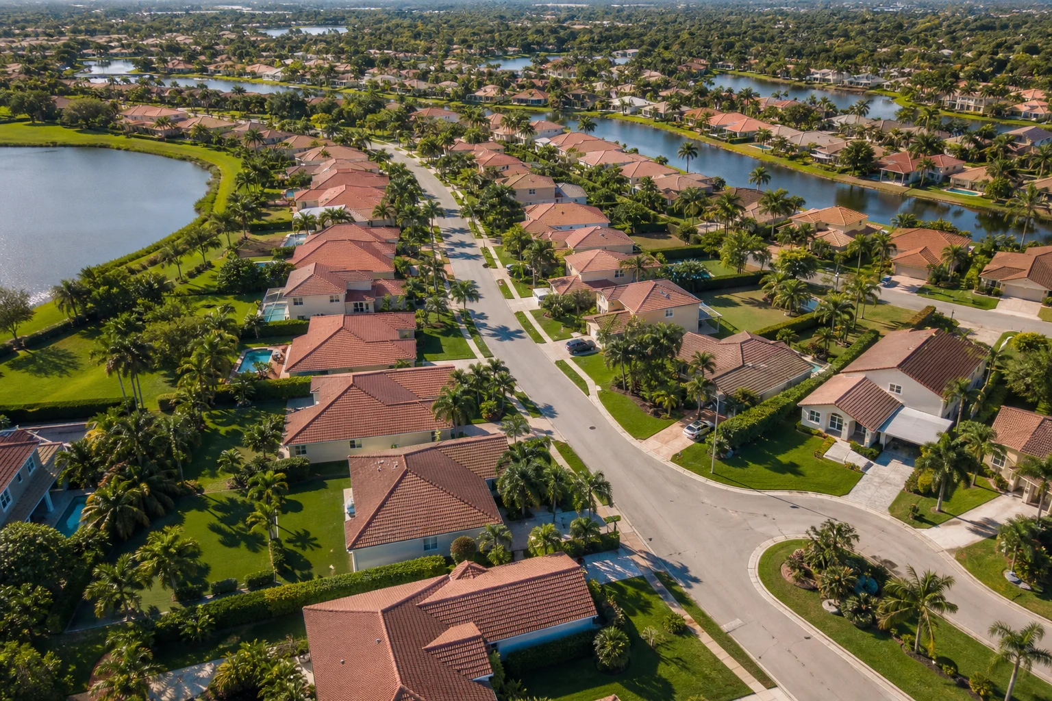 Aerial view of suburban residential rental properties illustrating the scale of real estate investments where accounting statistics prove most investors lose money on taxes