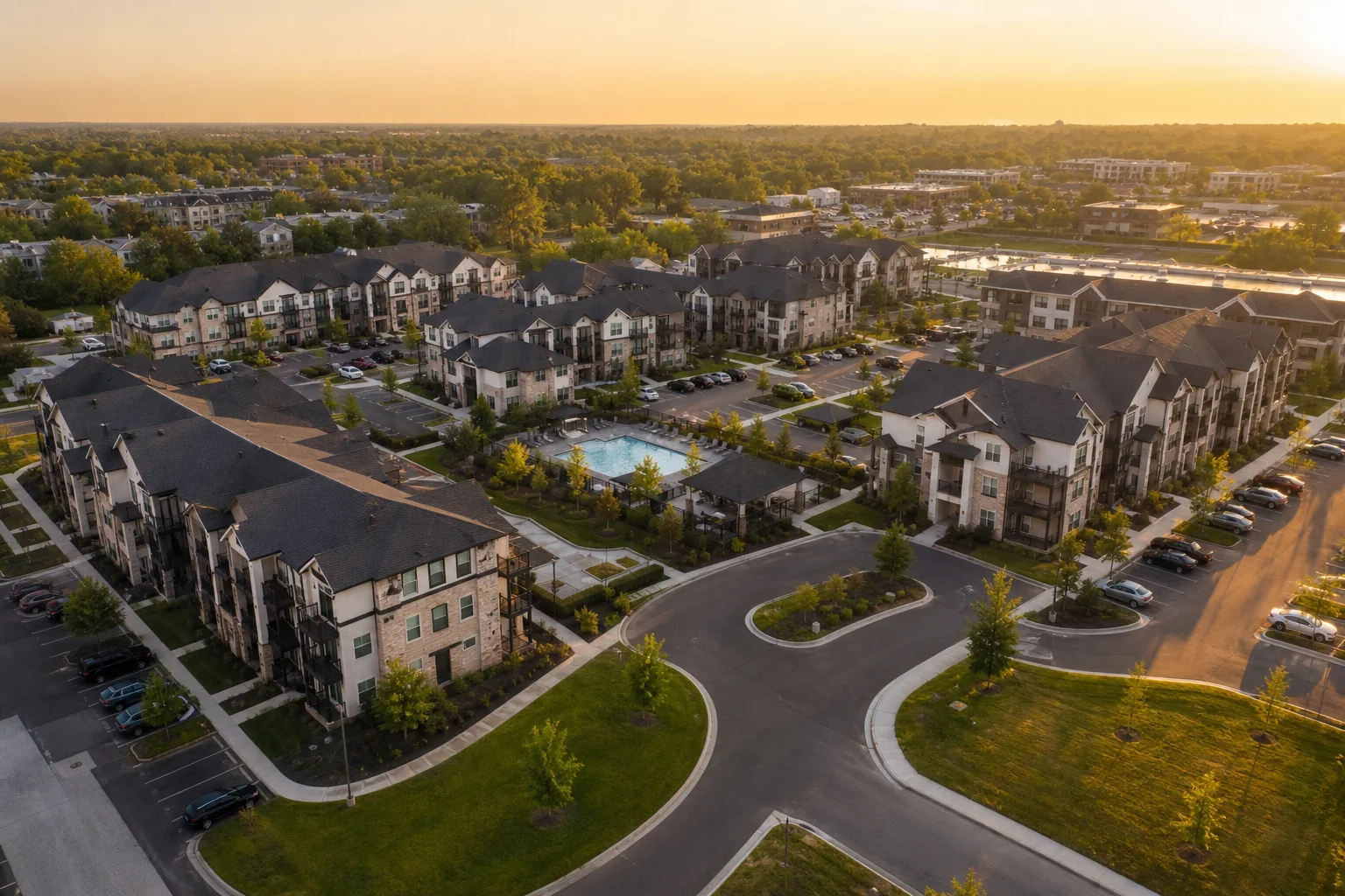 Aerial view of a multifamily apartment complex representing real estate portfolios managed through automated accounting workflows