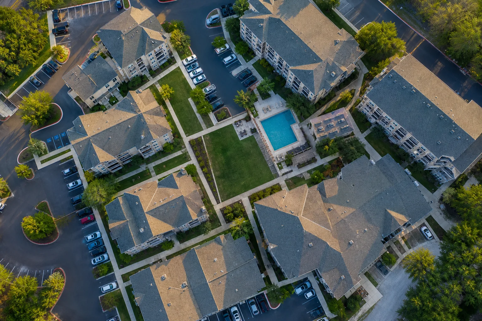 Aerial view of an apartment community illustrating a ratio utility billing system across multiple units