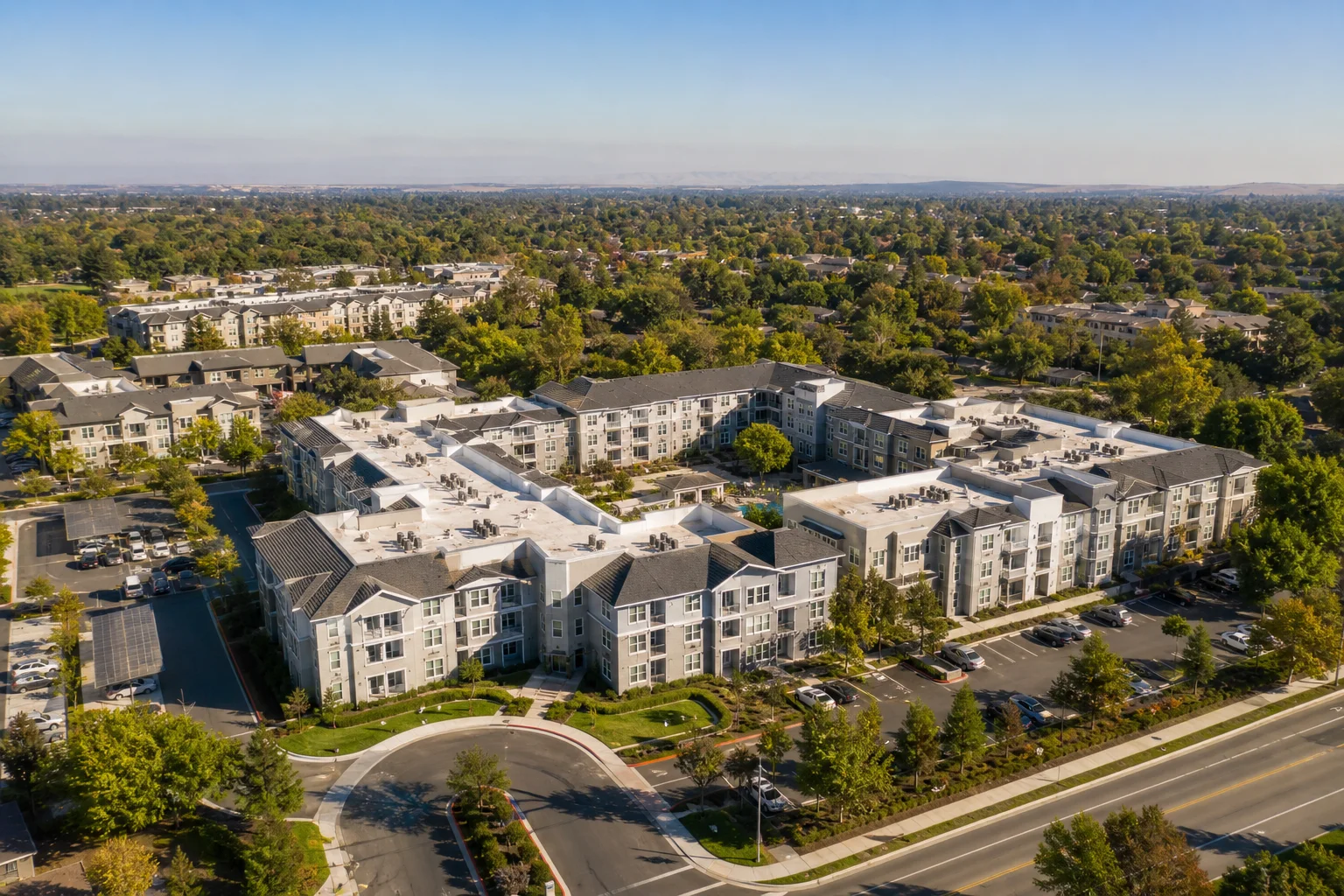 Aerial view of a multi-family rental property complex representing the section 199a deduction for rental property owners
